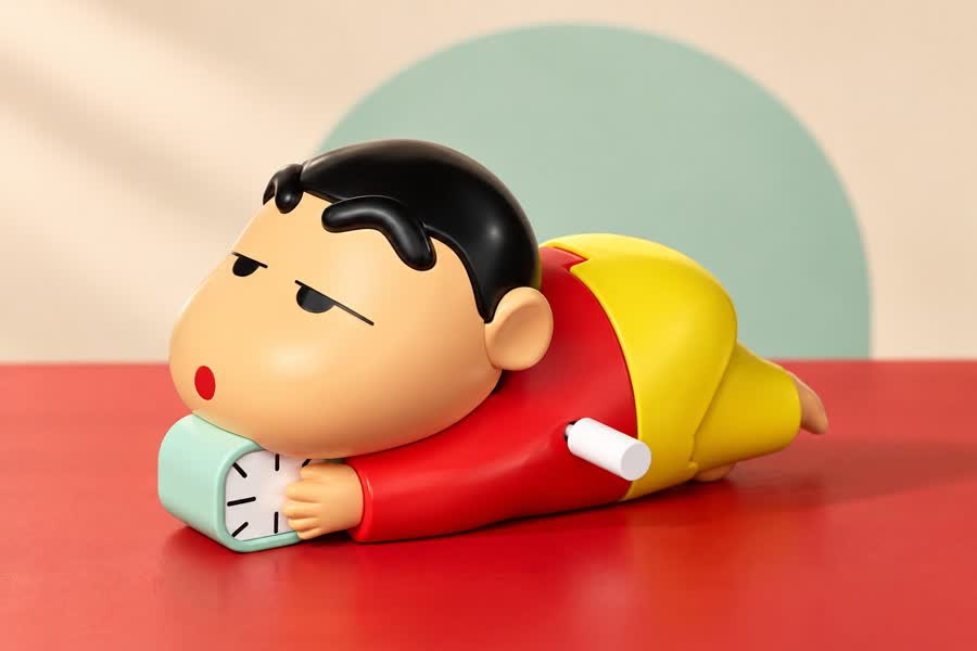 Styled close-up of Shinchan and the white winding key